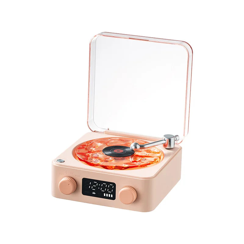 Charming Mini Retro Bluetooth Speaker from My Store in a soft pink color, perfect for any decor.